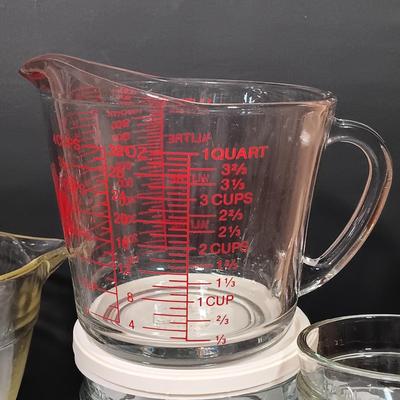 LOT 165: The Pampered Chef Apple Peeler and Prep Bowls with Nantucket Pie Plate, Fire King Measuring Cup & More