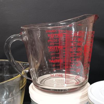 LOT 165: The Pampered Chef Apple Peeler and Prep Bowls with Nantucket Pie Plate, Fire King Measuring Cup & More