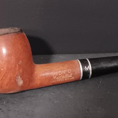 LOT 169: Medico Medalist Pipe, Watch Parts, Ian Logan's Filling Stations Tins & More