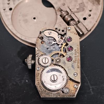 LOT 169: Medico Medalist Pipe, Watch Parts, Ian Logan's Filling Stations Tins & More