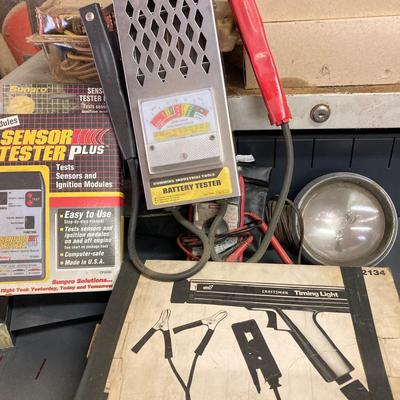 LOT 244: Garage Cabinet Finds - Portable Battery Tester, Sensor Tester Plus, Sears Craftsman Timing Light and More