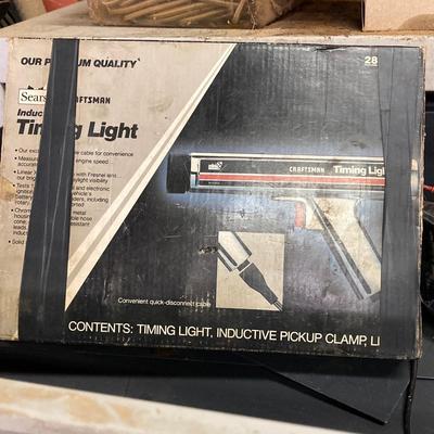 LOT 244: Garage Cabinet Finds - Portable Battery Tester, Sensor Tester Plus, Sears Craftsman Timing Light and More