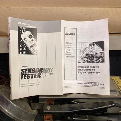 LOT 244: Garage Cabinet Finds - Portable Battery Tester, Sensor Tester Plus, Sears Craftsman Timing Light and More