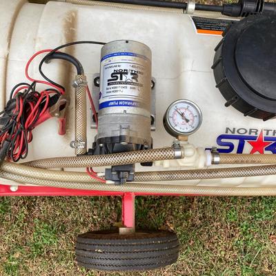 LOT 246: NorthStar Spreader on Tow Behind Rolling Utility Cart