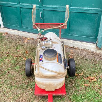 LOT 246: NorthStar Spreader on Tow Behind Rolling Utility Cart
