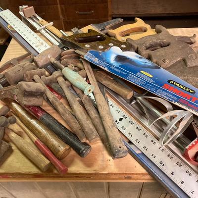 LOT 247: Large Tool Collection - Hammers, Hand Saws, Levels, T-Squares, Rulers and More