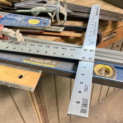 LOT 247: Large Tool Collection - Hammers, Hand Saws, Levels, T-Squares, Rulers and More