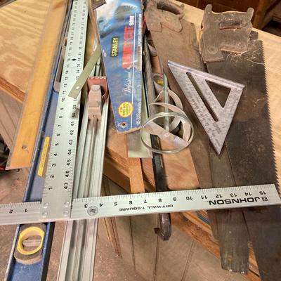 LOT 247: Large Tool Collection - Hammers, Hand Saws, Levels, T-Squares, Rulers and More