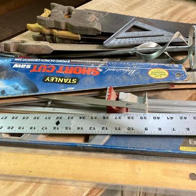 LOT 247: Large Tool Collection - Hammers, Hand Saws, Levels, T-Squares, Rulers and More