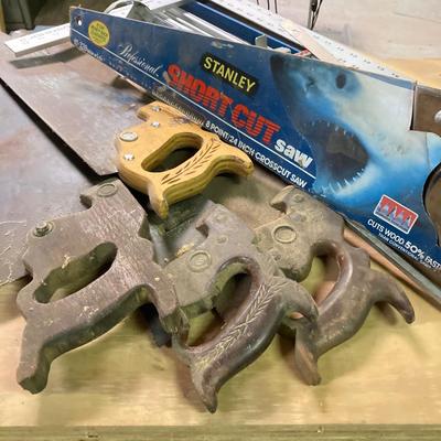 LOT 247: Large Tool Collection - Hammers, Hand Saws, Levels, T-Squares, Rulers and More