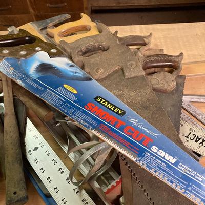 LOT 247: Large Tool Collection - Hammers, Hand Saws, Levels, T-Squares, Rulers and More