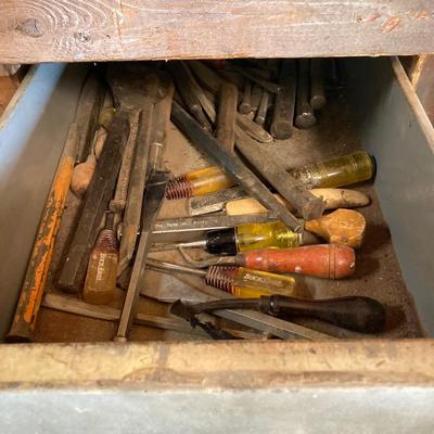 LOT 252: Garage Cabinet Finds - Gasket Hole Punch Set, Butt Chisels, Hollow Punch Set, Sharpening Stones and More