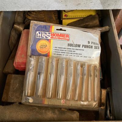 LOT 252: Garage Cabinet Finds - Gasket Hole Punch Set, Butt Chisels, Hollow Punch Set, Sharpening Stones and More