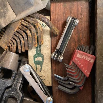 LOT 252: Garage Cabinet Finds - Gasket Hole Punch Set, Butt Chisels, Hollow Punch Set, Sharpening Stones and More