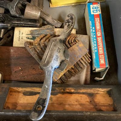 LOT 252: Garage Cabinet Finds - Gasket Hole Punch Set, Butt Chisels, Hollow Punch Set, Sharpening Stones and More