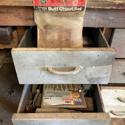 LOT 252: Garage Cabinet Finds - Gasket Hole Punch Set, Butt Chisels, Hollow Punch Set, Sharpening Stones and More