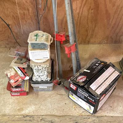 LOT 254: Pipe Clamps, Box of Grip Rite Framing Nails, Plastic Staples, Wing Guards, Hardware and More