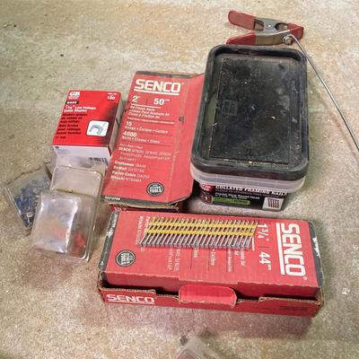 LOT 254: Pipe Clamps, Box of Grip Rite Framing Nails, Plastic Staples, Wing Guards, Hardware and More