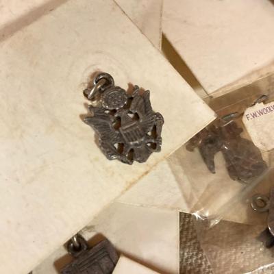 LOT 258: Vintagae Jewelry and Craft Finds - Charms, Gold Tone Corner Pieces, Pin / Tack Backs and More