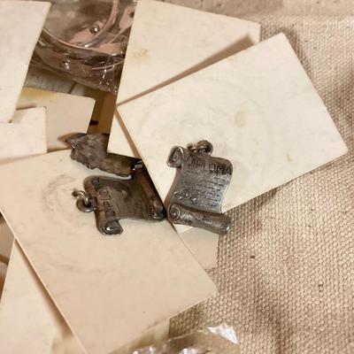 LOT 258: Vintagae Jewelry and Craft Finds - Charms, Gold Tone Corner Pieces, Pin / Tack Backs and More