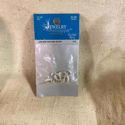 LOT 258: Vintagae Jewelry and Craft Finds - Charms, Gold Tone Corner Pieces, Pin / Tack Backs and More