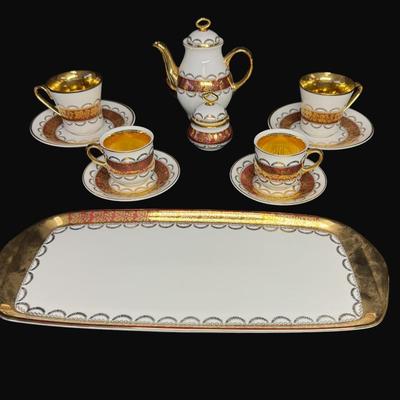 Sale Photo Thumbnail #217: Service for two.  Teapot, sugar bowl, tea cups, and saucers.  [RE]