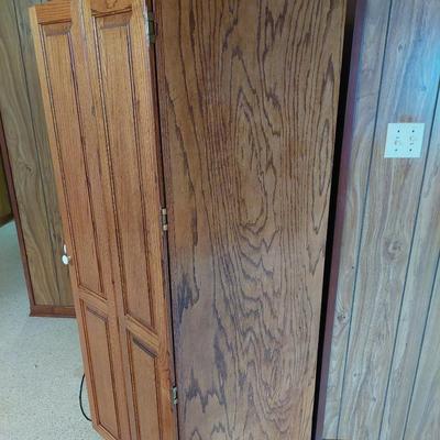 Sale Photo Thumbnail #64: Ver nice entertainment center could be used for alot of things with closing doors. Dimensions are 74 " tall 54" wide &24" deep