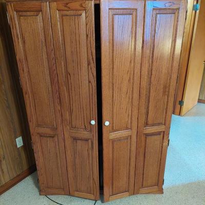 Sale Photo Thumbnail #63: Ver nice entertainment center could be used for alot of things with closing doors. Dimensions are 74 " tall 54" wide &24" deep