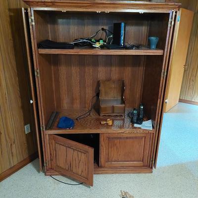 Sale Photo Thumbnail #62: Ver nice entertainment center could be used for alot of things with closing doors. Dimensions are 74 " tall 54" wide &24" deep