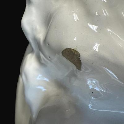 Sale Photo Thumbnail #229: Two pieces. Appears to be a man and woman square dancing.  There are two small chips (pictured). Tallest is 17". [RE]