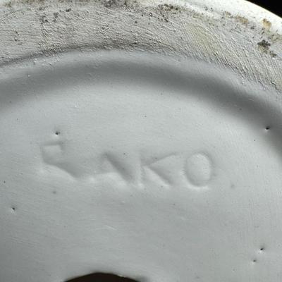 Sale Photo Thumbnail #228: Two pieces. Appears to be a man and woman square dancing.  There are two small chips (pictured). Tallest is 17". [RE]