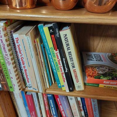 Sale Photo Thumbnail #100: A great lot of cookbooks, healthy life, gardening and so many others. You get them all. The bookcase is not part of the lot but also for sale.