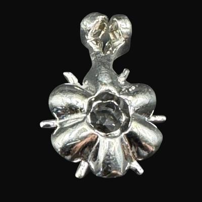 Sale Photo Thumbnail #250: **WIRE TRANSFER IS REQUIRED IF SHIPPED.** [1.01g] This pendant is set in white gold with a late Deco design, and features a prong set quartz stone. Measurement: .50”L (approximate). Gold content confirmed using Niton XRF precious metals analyzer. Stone 