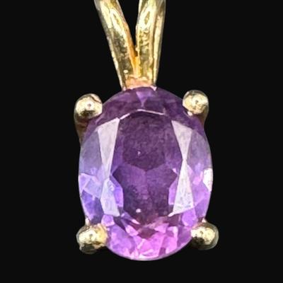 Sale Photo Thumbnail #251: **WIRE TRANSFER IS REQUIRED IF SHIPPED.** [1.26g] This emerald cut amethyst pendant is prong set in yellow gold.  Approximately 2.5 carat amethyst. **ALL PRECIOUS METALS SALES ARE FINAL. NO REFUNDS WILL BE GIVEN FOR ANY REASON.** [KB]