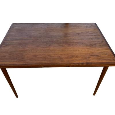 Sale Photo Thumbnail #274: H. Sigh & Son dining table with two hidden leaves. Teak construction. The table functions as it should. The table top can be removed. Age related wear. Closed dimensions: 49"L x 33.5"W.  Open or extended: 90"L x 33.5"W. [CS]