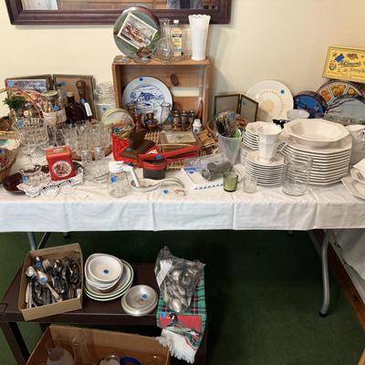 Sale Photo Thumbnail #39: Dishes, tins, glassware, books, custom curtains, mirror, silverware, framed art, etc
****Table, table cloth, plastic shelf, 2 wooden shelves, plate stands not included)****