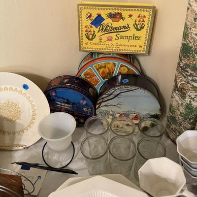 Sale Photo Thumbnail #40: Dishes, tins, glassware, books, custom curtains, mirror, silverware, framed art, etc
****Table, table cloth, plastic shelf, 2 wooden shelves, plate stands not included)****