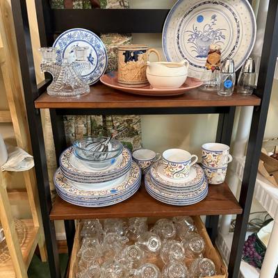 Sale Photo Thumbnail #34: Dishes, tins, glassware, books, custom curtains, mirror, silverware, framed art, etc
****Table, table cloth, plastic shelf, 2 wooden shelves, plate stands not included)****