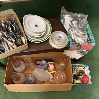 Sale Photo Thumbnail #38: Dishes, tins, glassware, books, custom curtains, mirror, silverware, framed art, etc
****Table, table cloth, plastic shelf, 2 wooden shelves, plate stands not included)****
