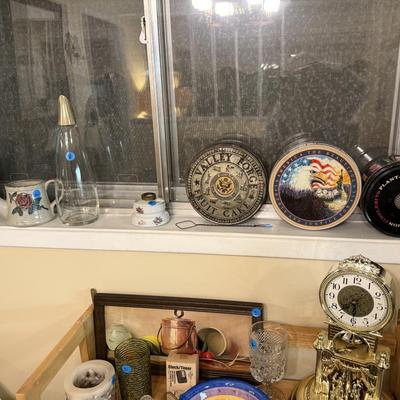 Sale Photo Thumbnail #35: Dishes, tins, glassware, books, custom curtains, mirror, silverware, framed art, etc
****Table, table cloth, plastic shelf, 2 wooden shelves, plate stands not included)****