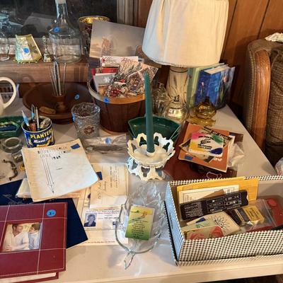 Sale Photo Thumbnail #55: Upholstered chair, lamps, candles, wood file cabinet, metal cabinet, ephemera, dishes, vases, decor, wall paper, ribbon, baskets, mirror,  railroad memorabilia, local advertising items, metal art, records, 8Track, cassettes, etc
****Table, wire shelf, pla