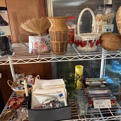 Sale Photo Thumbnail #51: Upholstered chair, lamps, candles, wood file cabinet, metal cabinet, ephemera, dishes, vases, decor, wall paper, ribbon, baskets, mirror,  railroad memorabilia, local advertising items, metal art, records, 8Track, cassettes, etc
****Table, wire shelf, pla