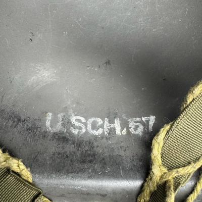 Sale Photo Thumbnail #324: Includes two Korean/Vietnam Era helmets with liners, a USMC flight cap, a USN "Dixie Cup" hat, and a WWII Era Haversack. Total of five pieces. Age related wear. [JP]