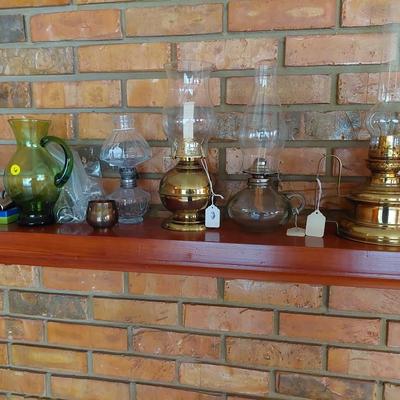 Sale Photo Thumbnail #132: Some great oil lamps some vintage. You get all in the pictures and I will give you a gallon of oil for free. Would make perfect holiday gifts.