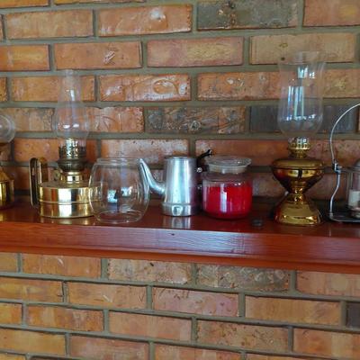 Sale Photo Thumbnail #131: Some great oil lamps some vintage. You get all in the pictures and I will give you a gallon of oil for free. Would make perfect holiday gifts.