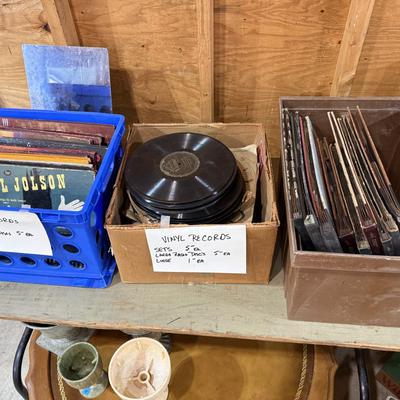 Sale Photo Thumbnail #73: Records, Baskets, frames, vases, Pottery coffee Table, mirror, Upholstery supplies, cabinet, and more.
****DOES NOT INCLUDE: wooden table, card table, blue crate****
