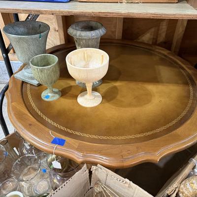 Sale Photo Thumbnail #74: Records, Baskets, frames, vases, Pottery coffee Table, mirror, Upholstery supplies, cabinet, and more.
****DOES NOT INCLUDE: wooden table, card table, blue crate****