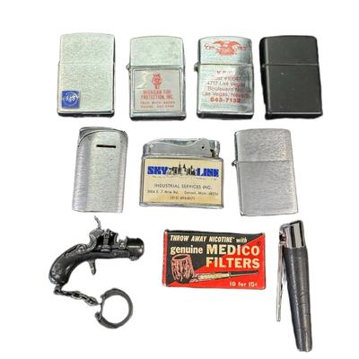 Sale Photo Thumbnail #332: Includes Zippo, and more. Total of eight-plus pieces. Not tested. [JP]
