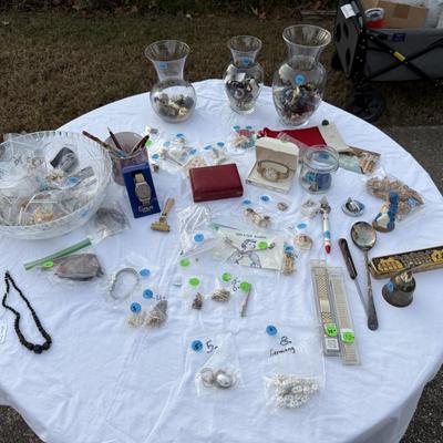 Sale Photo Thumbnail #81: Costume jewelry, watches, advertising pens, collectibles, vases of jewelry,
DOES NOT INCLUDE: table or tablecloth