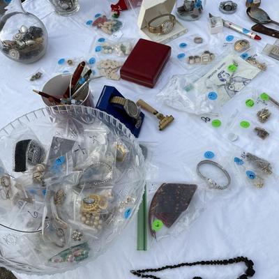 Sale Photo Thumbnail #84: Costume jewelry, watches, advertising pens, collectibles, vases of jewelry,
DOES NOT INCLUDE: table or tablecloth